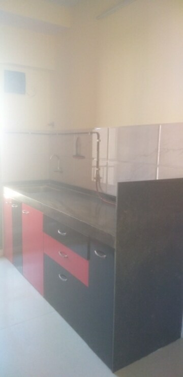 Kitchen in 3 BHK Apartment at Dev Ashoka Apartment, Vartak Nagar – for Rent