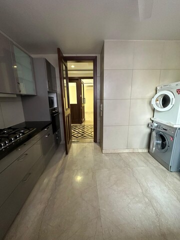 Kitchen in 4 BHK Apartment at Safdarjang Enclave – for Rent