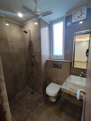 Bathroom in 4 BHK Apartment at Safdarjung Development Area – for Rent