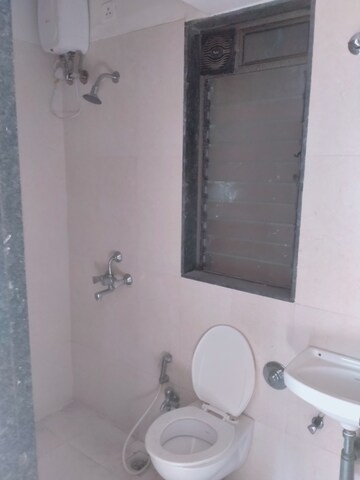 Bathroom in 2 BHK Apartment at New Home Paradise Apartment, Virar West – for Sale