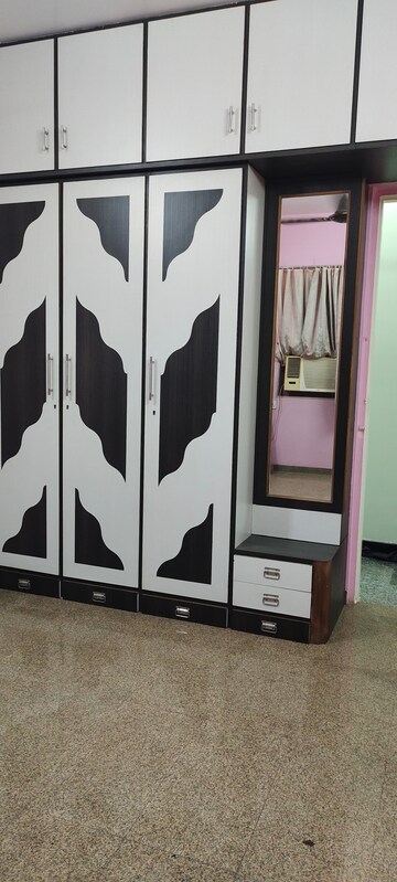 Master Bedroom in 1 BHK Apartment at Dheeraj Uphar CHS. LTD., Malad East – for Rent
