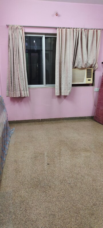 Room in 1 BHK Apartment at Dheeraj Uphar CHS. LTD., Malad East – for Rent