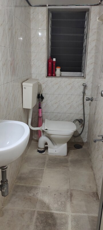 Bathroom in 1 BHK Apartment at Dheeraj Uphar CHS. LTD., Malad East – for Rent
