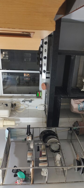 Kitchen in 1 BHK Apartment at Dheeraj Uphar CHS. LTD., Malad East – for Rent