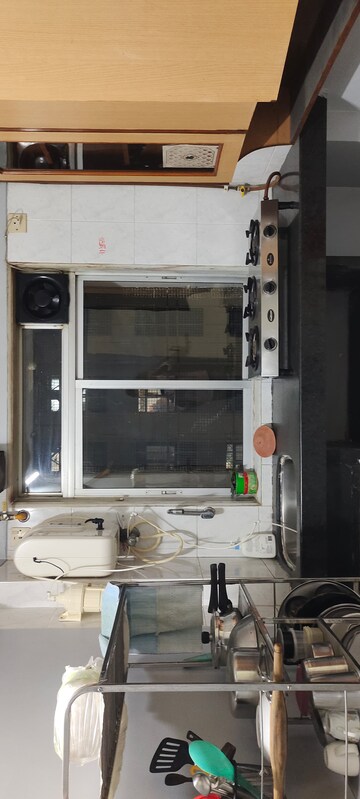 Kitchen in 1 BHK Apartment at Dheeraj Uphar CHS. LTD., Malad East – for Rent