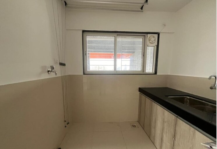 Kitchen, shree-venkatesh-graffiti-glover 2 Bedroom 827 Sq.Ft. Apartment In Keshav Nagar Pune 8038183