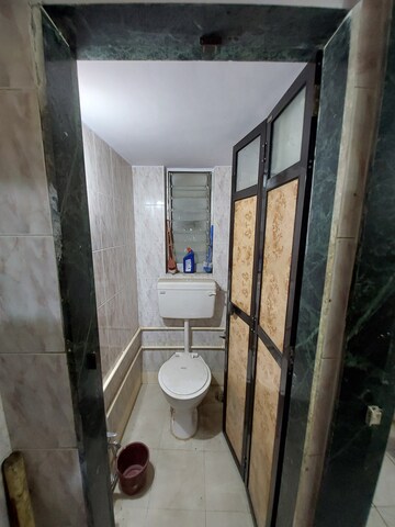 Bathroom in 1 BHK Apartment at Dombivli West – for Sale