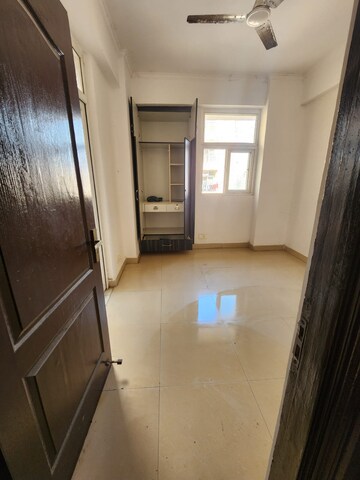 Building Lobby in 2.5 BHK Apartment at Amrapali Princely Estate, Sector 76 – for Rent