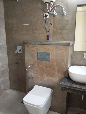 Bathroom in 4 BHK Builder Floor at Ansal Sushant Lok I, Sector 43 – for Rent