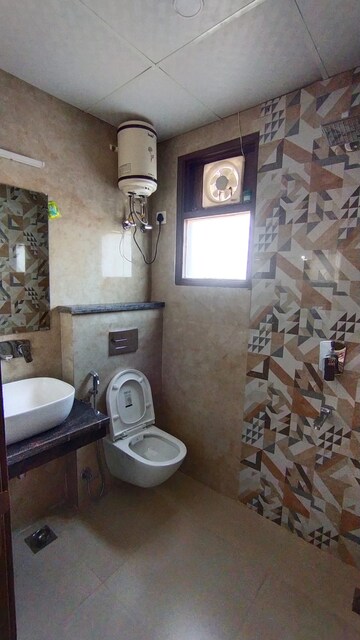 Bathroom in 4 BHK Builder Floor at Ansal Sushant Lok I, Sector 43 – for Rent