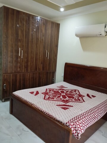 Bedroom in 4 BHK Builder Floor at Ansal Sushant Lok I, Sector 43 – for Rent