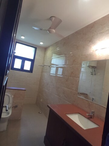 Bathroom in 4 BHK Apartment at Geetanjali Enclave – for Rent