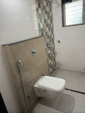 Bathroom in 2 BHK Apartment at Shapoorji Pallonji Joyville Hinjewadi, Hinjewadi – for Rent