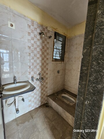 Bathroom in 2 BHK Apartment at Dedhia Golden Park II, Kalyan West – for Rent