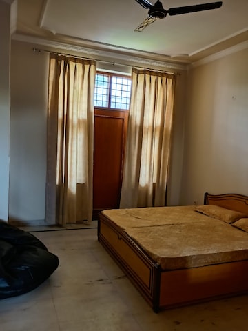 Bedroom in 3 BHK Builder Floor at Ansal Sushant Lok I, Sector 43 – for Rent