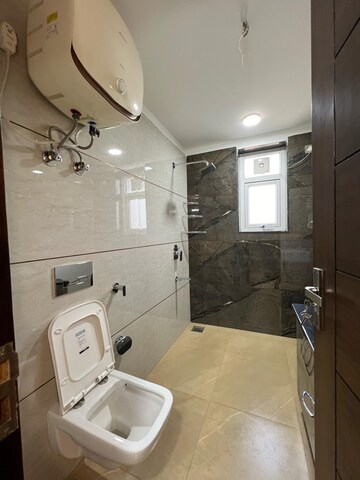 Bathroom in 4 BHK Builder Floor at Ansal Plaza Sector-23, Sector 23 – for Rent