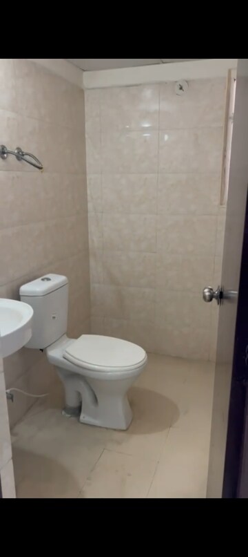 Bathroom in 3 BHK Apartment at Windsor Paradise 2, Raj Nagar Extension – for Rent