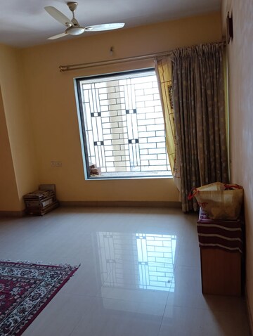Living Room in 1 BHK Apartment at Bluebell Apartments, Ghodbunder Road – for Sale