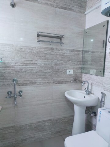 Bathroom in 4 BHK Builder Floor at Ansal Sushant Lok I, Sector 43 – for Rent