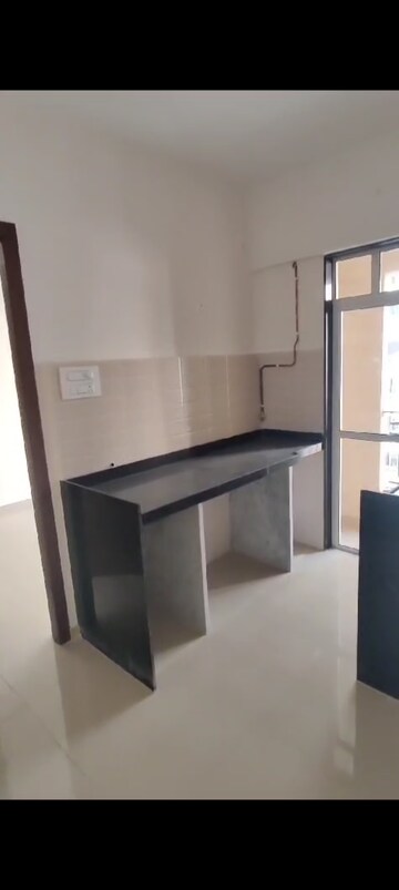 Kitchen in 1 BHK Apartment at JP North, Mira Road – for Sale