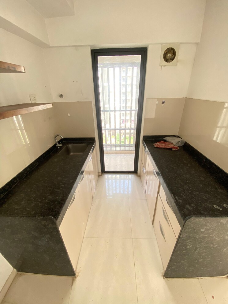 Kitchen, lodha-palava-downtown-dombivli-east 1.5 Bedroom 868 Sq.Ft. Apartment In Dombivli East Thane 8039081