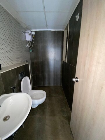 Bathroom in 1.5 BHK Apartment at Lodha Palava City Lakeshore Greens, Dombivli East – for Sale