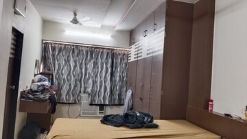 Master Bedroom in 2 BHK Apartment at Park Avenue Apartment Kandivali, Kandivali West – for Rent