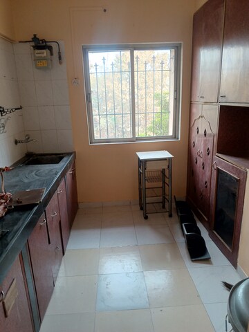Kitchen in 1 BHK Apartment at Happy Valley, Manpada – for Rent