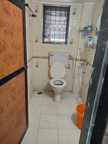 Bathroom in 1 BHK Apartment at Twins Hallmark, Kopar Khairane – for Rent