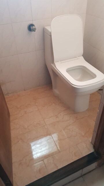Bathroom in 2 BHK Apartment at Naiknavare Gardenia Society Phase 1, Wadgaon Sheri – for Rent