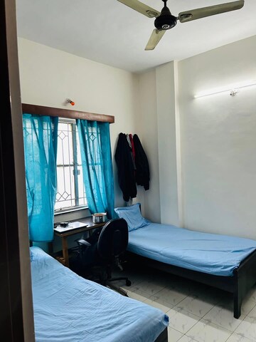 Bedroom in 2 BHK Apartment at Naiknavare Gardenia Society Phase 1, Wadgaon Sheri – for Rent