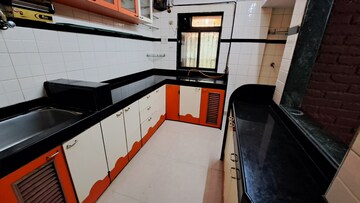 Kitchen in 2 BHK Apartment at Shubharambh Complex, Manpada – for Sale
