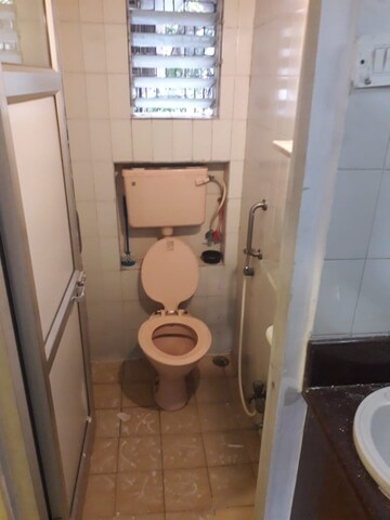 Bathroom in 2 BHK Apartment at Eff Jumbo Darshan CHS, Andheri East – for Rent