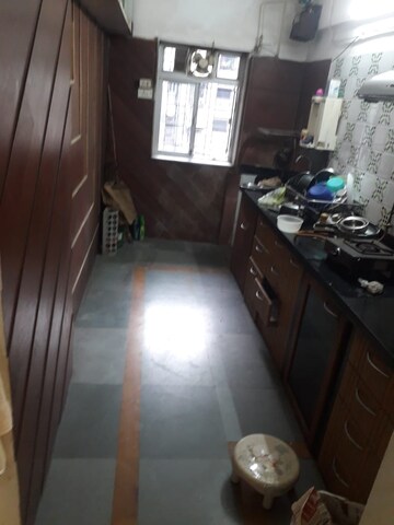 Kitchen in 2 BHK Apartment at Eff Jumbo Darshan CHS, Andheri East – for Rent