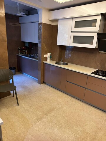 Kitchen in 4 BHK Builder Floor at DLF Square, Sector 25 – for Rent