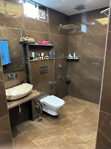 Master Bedroom in 4 BHK Builder Floor at DLF Square, Sector 25 – for Rent