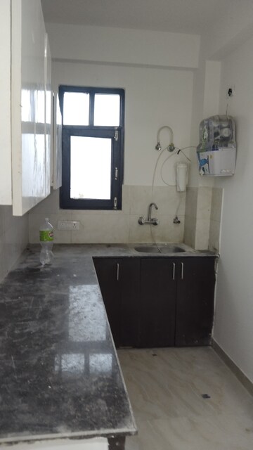 Kitchen in 2 BHK Builder Floor at Lucky The Palm Valley, Sector 1 Greater Noida – for Sale