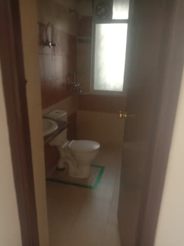 Bathroom in 3 BHK Apartment at Mahagun Mywoods, Sector 16c Greater Noida – for Rent