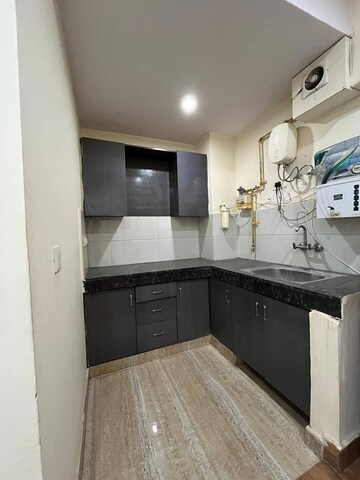 Kitchen in 2 BHK Apartment at Freedom Fighters Enclave – for Rent