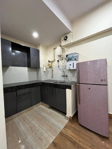 Kitchen in 2 BHK Apartment at Freedom Fighters Enclave – for Rent