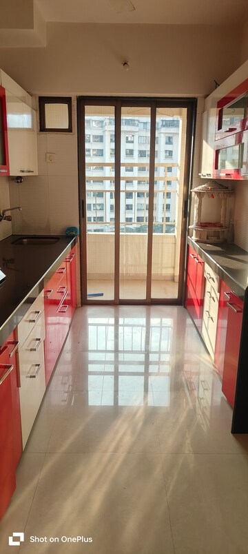 Kitchen in 2 BHK Apartment at Varun Garden, Ghodbunder Road – for Rent