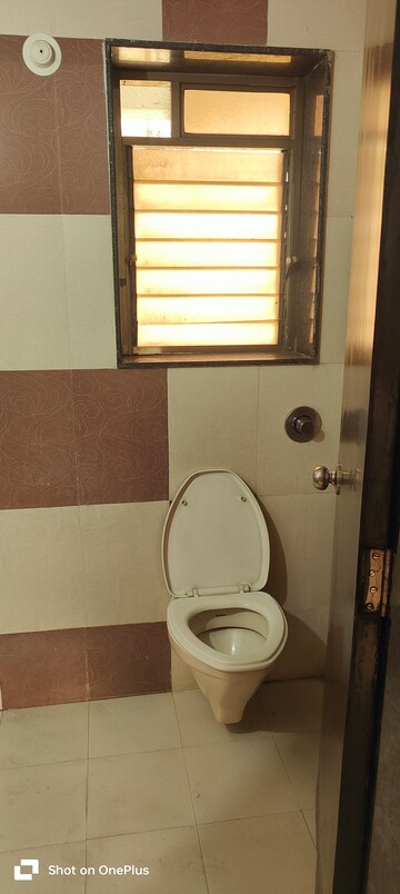 Bathroom in 2 BHK Apartment at Varun Garden, Ghodbunder Road – for Rent
