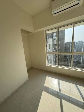 Bedroom in 2 BHK Apartment at Lodha Amara, Kolshet Road – for Rent
