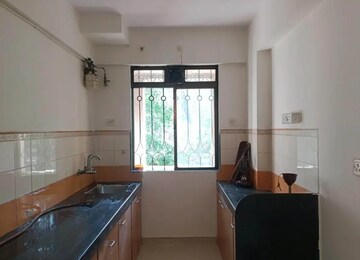 Kitchen in 2 BHK Apartment at Lodha Paradise, Majiwada – for Rent