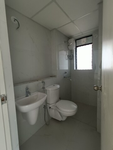 Bathroom in 2 BHK Apartment at Runwal Gardens, Dombivli East – for Rent