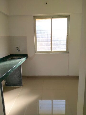 Kitchen in 1 BHK Apartment at Puraniks City Reserva, Ghodbunder Road – for Rent