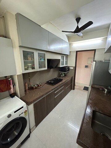 Kitchen in 2 BHK Apartment at Hiranandani Meadows, Manpada – for Rent