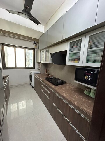 Kitchen in 2 BHK Apartment at Hiranandani Meadows, Manpada – for Rent
