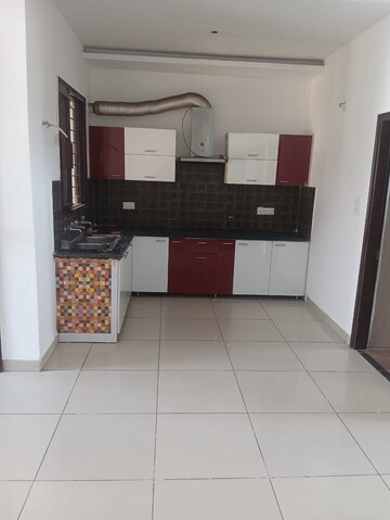 Kitchen in 3 BHK Apartment at Ansal API Victoria Floors, Dhakoli Village – for Rent