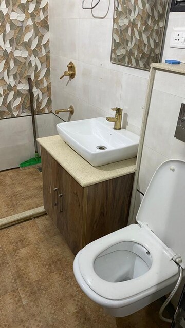 Bathroom in 3 BHK Apartment at Sushma Crescent, Dhakoli Village – for Rent